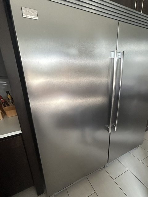 Stainless doors and handles of a Frigidaire Professional refrigerator column during a diagnostic visit