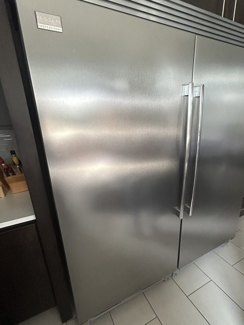 Stainless doors and handles of a Frigidaire Professional refrigerator column during a diagnostic visit